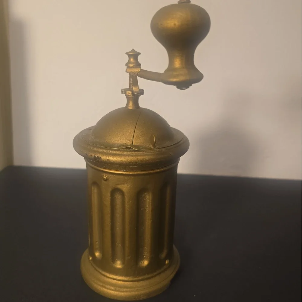 Antique F&B Tre Spade hand-crank coffee grinder with embossed three-spade logo.